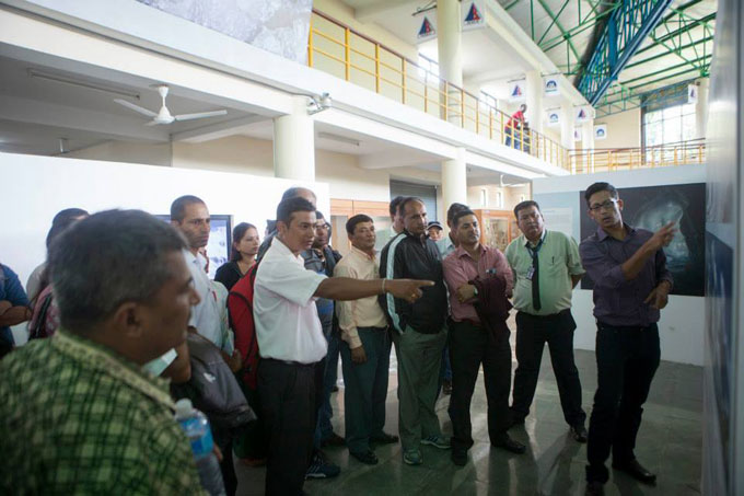 Niranjan Kunwar gives visiting school teachers and principals a guided tour. Photo: Shikhar Bhattarai